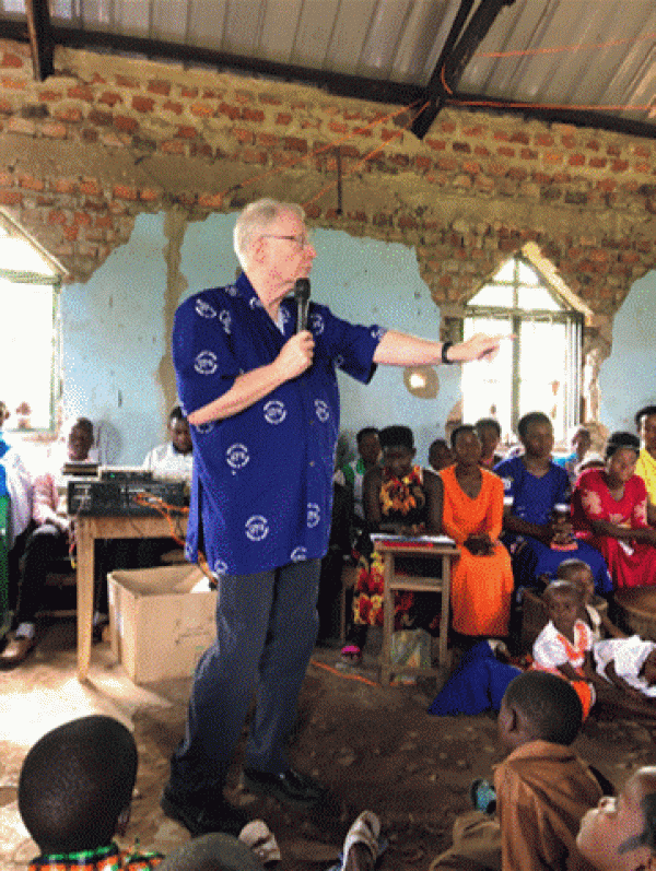 Ken preaching in the villages